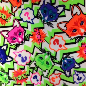 Floating neon fox heads on lime chevron spandex