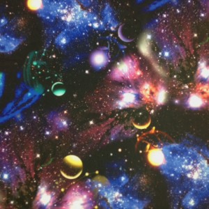 Galaxy stretch print of stars and planets on stretch fabric